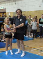 Maddie getting Junior Jumper award from Dave