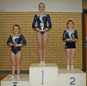 Winning membes of Brentwood Trampoline Club take a 1-2-3